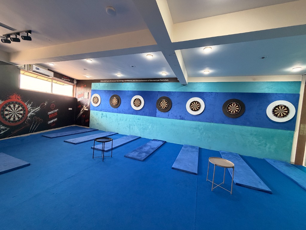 Darts Club arena interior seating area Palodia Ahmedabad
